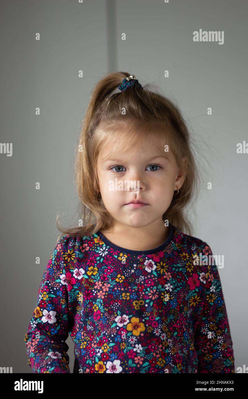Portrait of cute little girl on white background Stock Photo - Alamy
