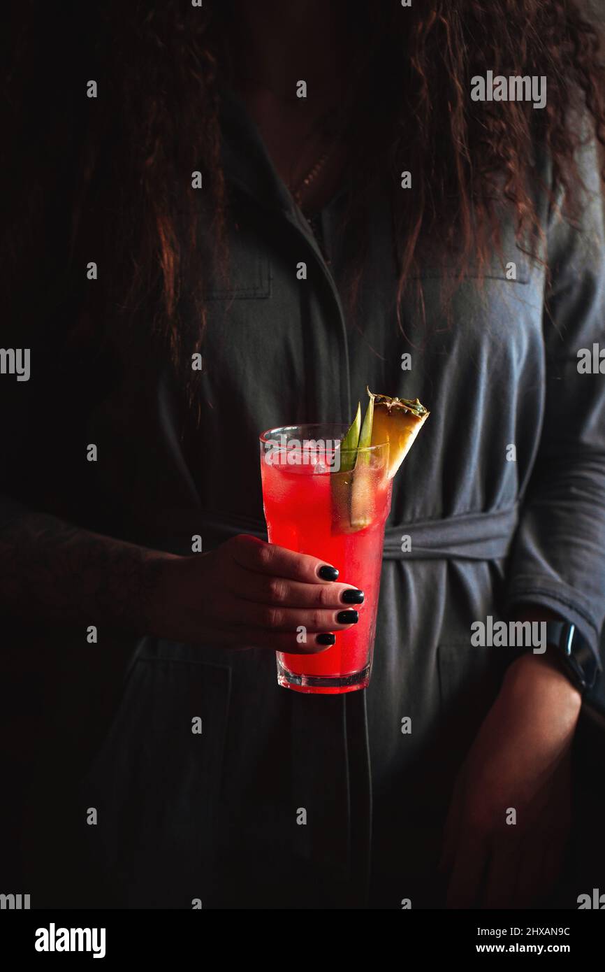 Female holding cocktail hi-res stock photography and images - Alamy