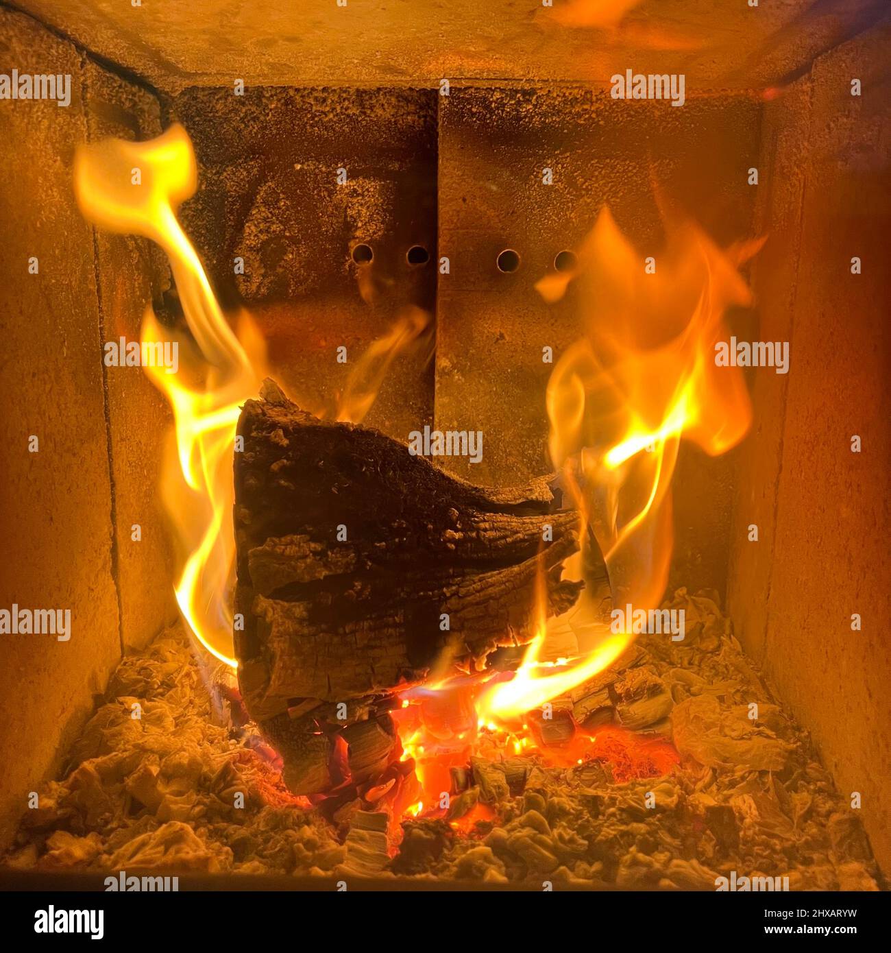 fire in the fireplace - log fire - warm, winter, energy, wood, stove - BookCover - Kaminfeuer, Feuer, Kaminofen, stove Stock Photo