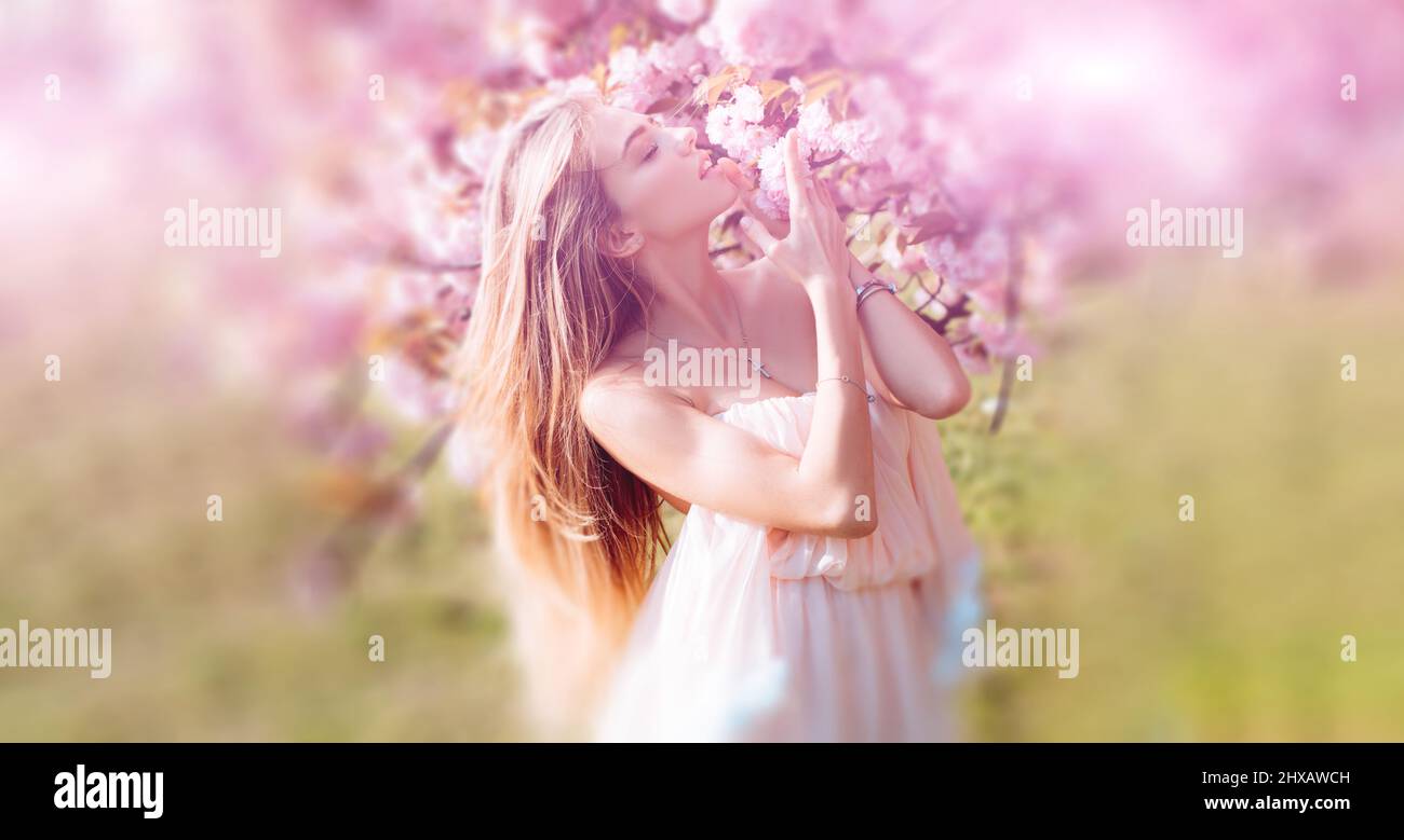 Beautiful spring young woman outdoors enjoying spring. Beautiful young ...