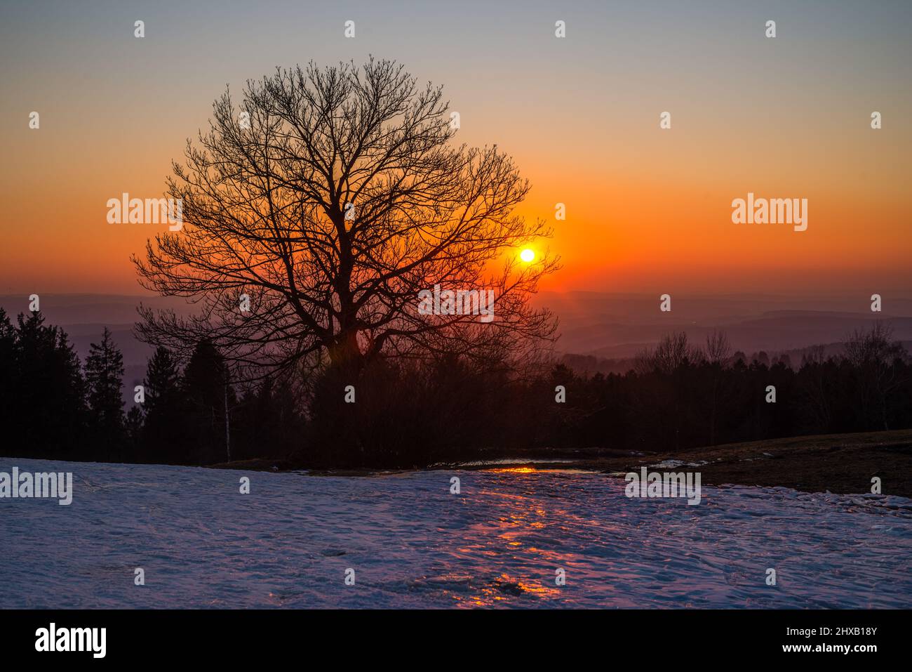 Winter in Schöneck, flammender Sonnenuntergang Stock Photo
