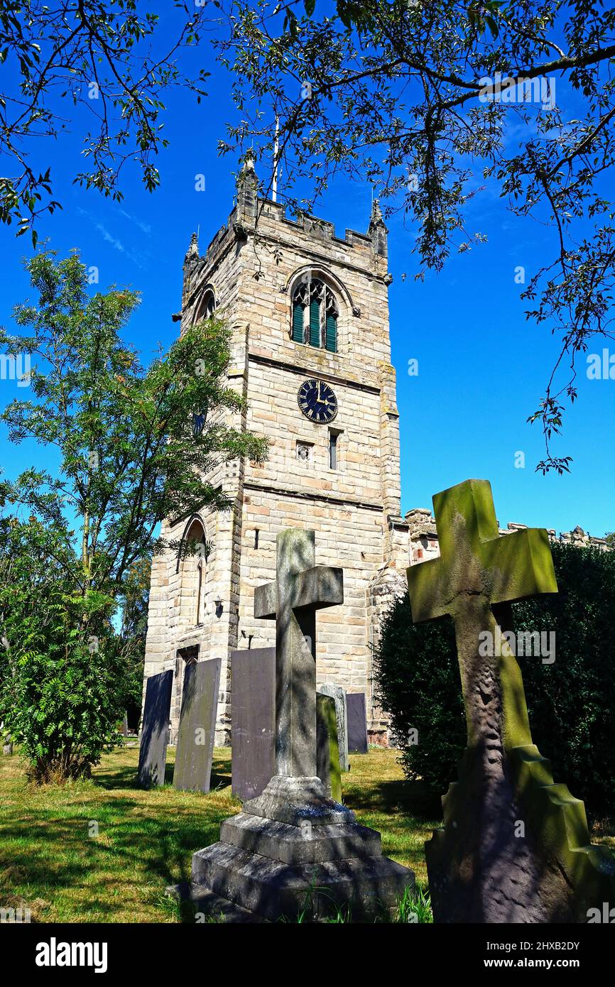 View of All Saints Church and churchyard along Church Lane, Kings Bromley, Staffordshire, England, UK, Europe. Stock Photo