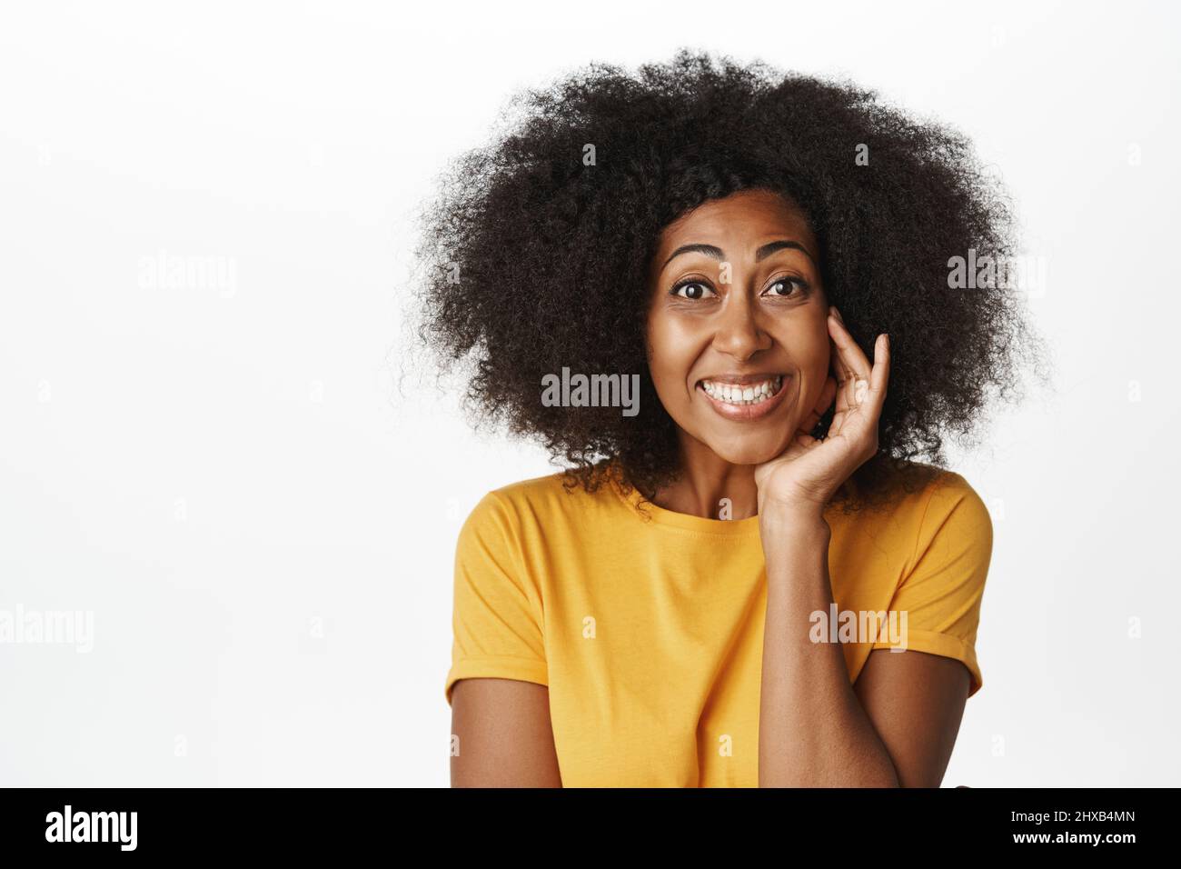 Close up portrait of beautiful african woman looking happy and carefree ...