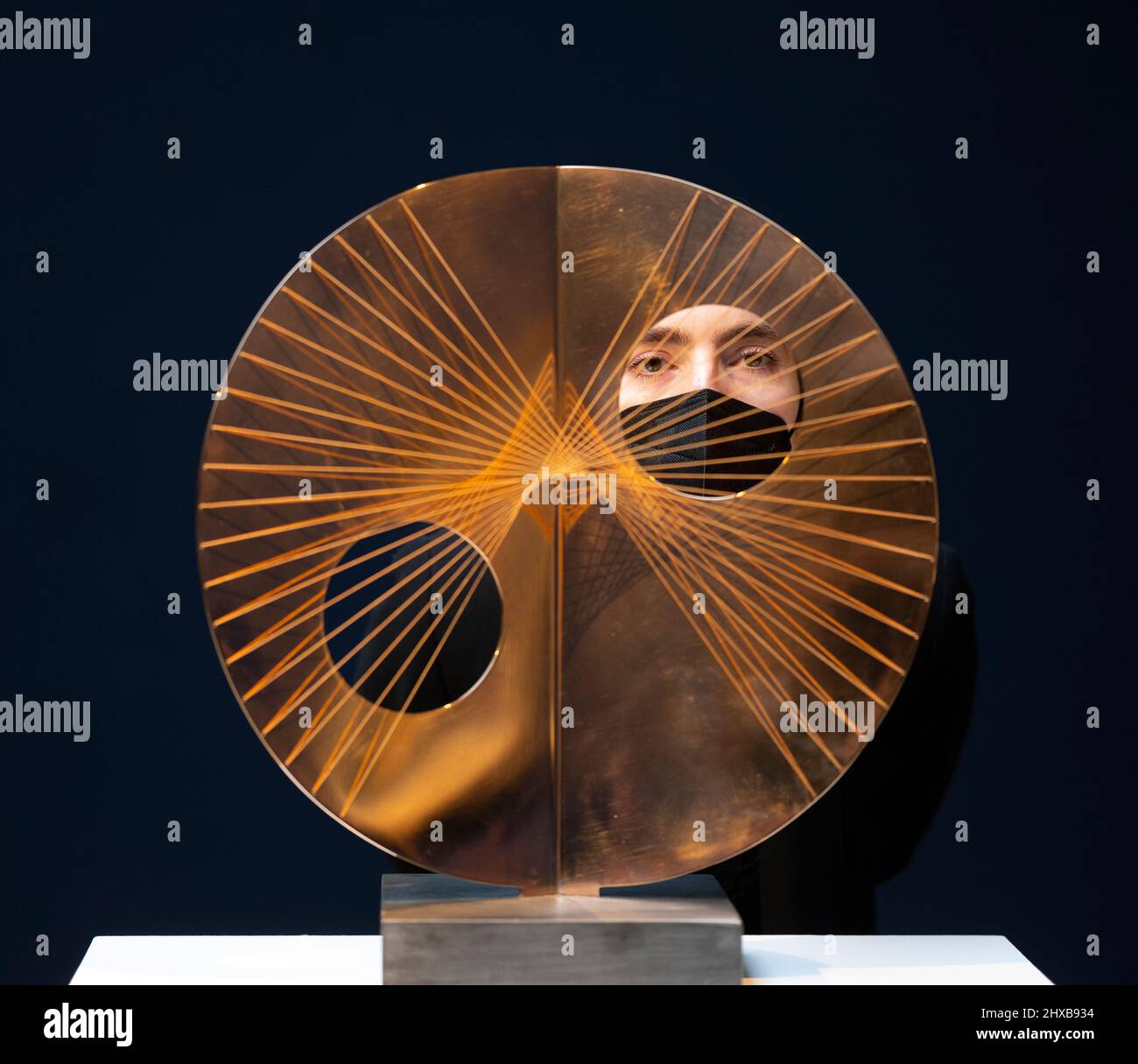 Christie’s, London, UK. 11 March 2022. Modern British and Irish Art Evening Sale takes place in London on 22 March 2022. Image: Dame Barbara Hepworth, Disc with Strings (Sun). Estimate £120,000-180,000. Credit: Malcolm Park/Alamy Live News Stock Photo