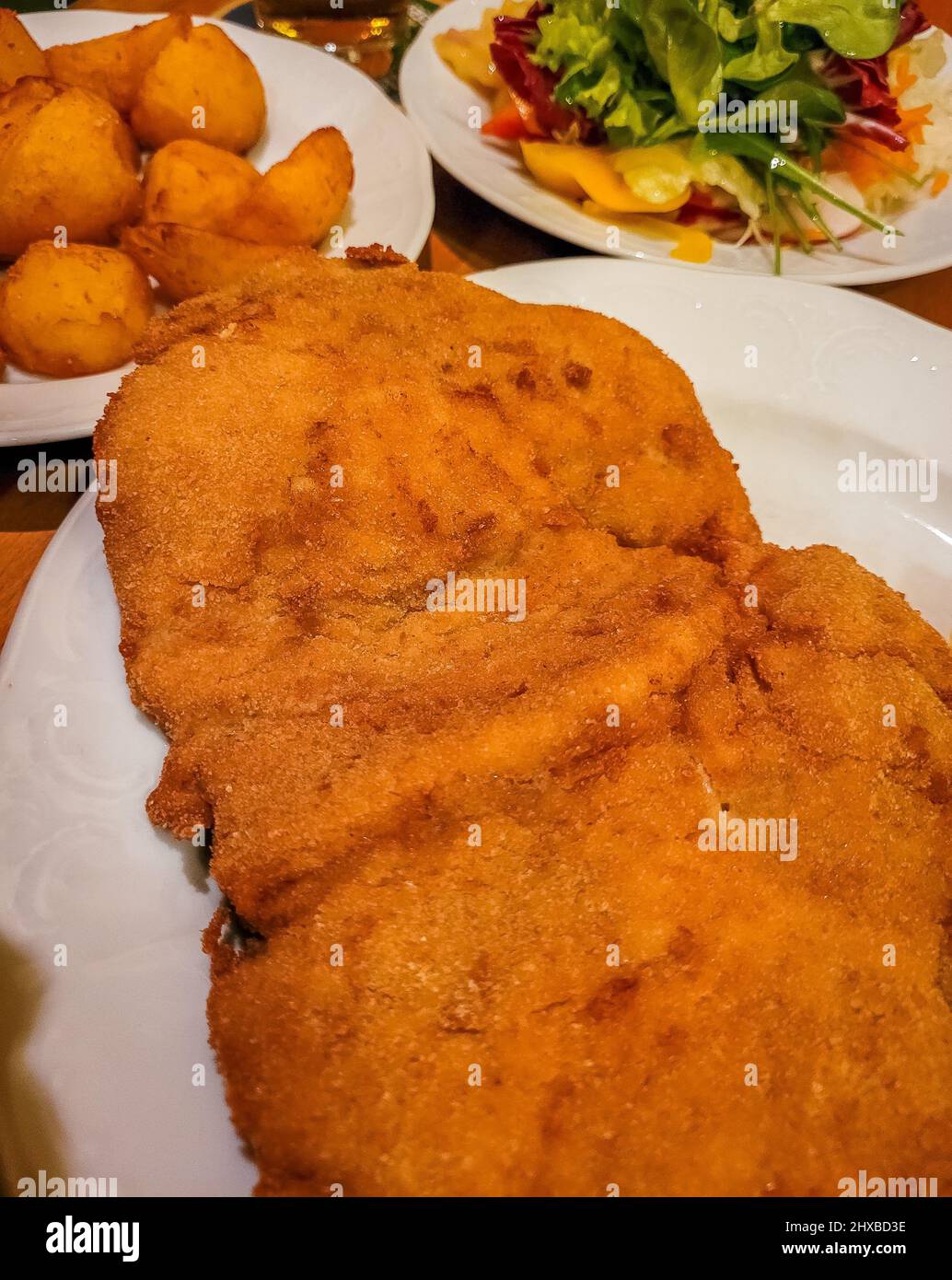 Close up of a delicious original Wiener Schnitzel in Vienna, Austria Stock Photo Alamy