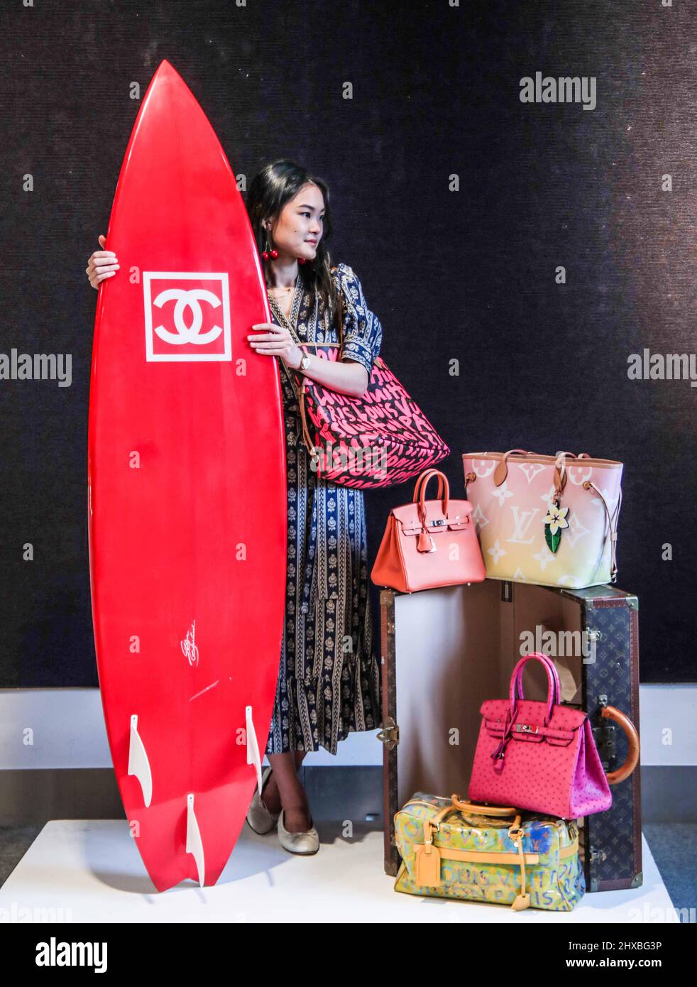 London UK 11 March 2020 A red carbon fibre Chanel Surfboard with three  keels– Chanel only made surfboards in limited numbers, and so it is really  rare to have one come up