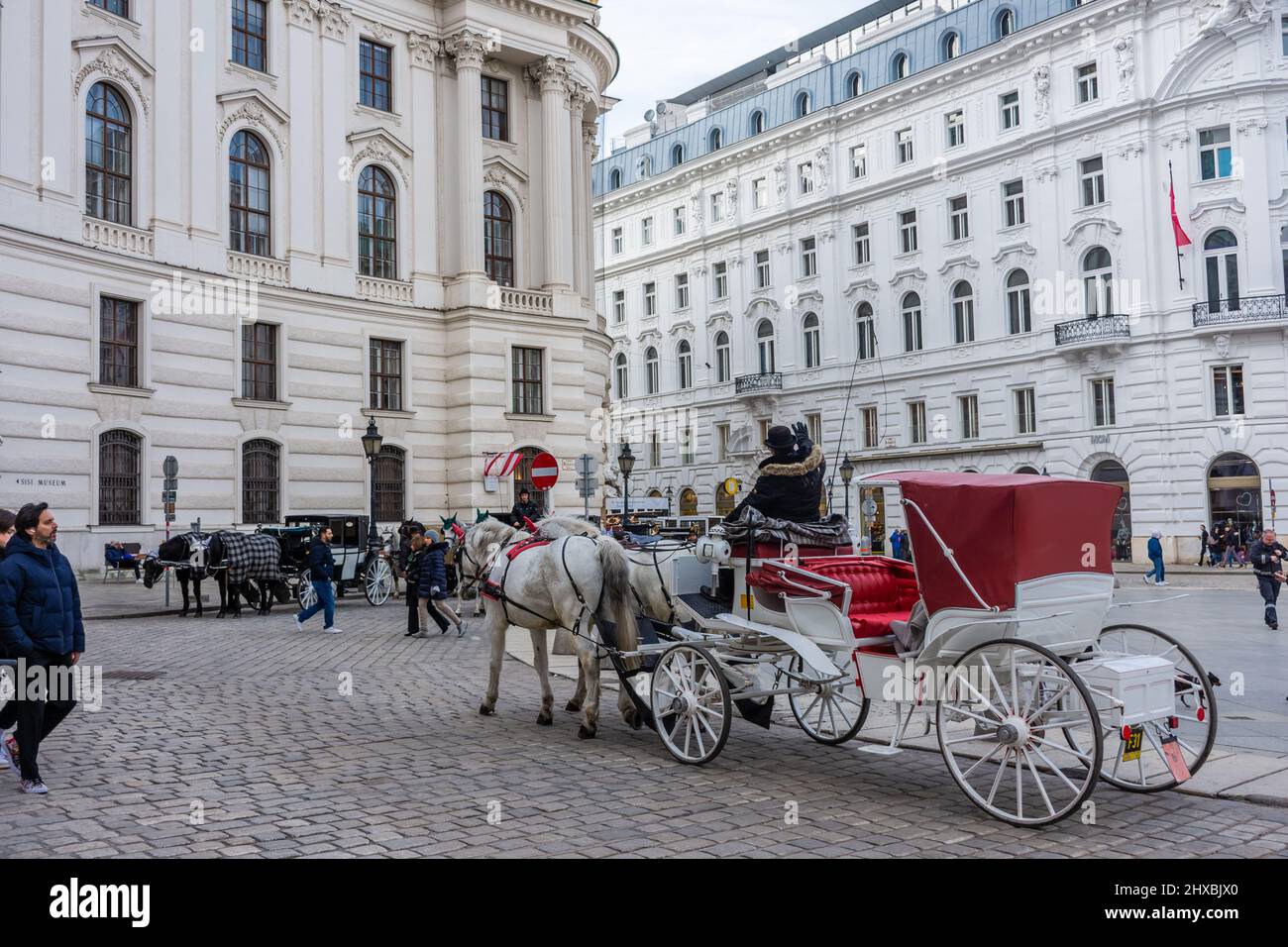 VIENNA, AUSTRIA, 19 FEBRUARY 2022: People walking nearby the Hofburg ...
