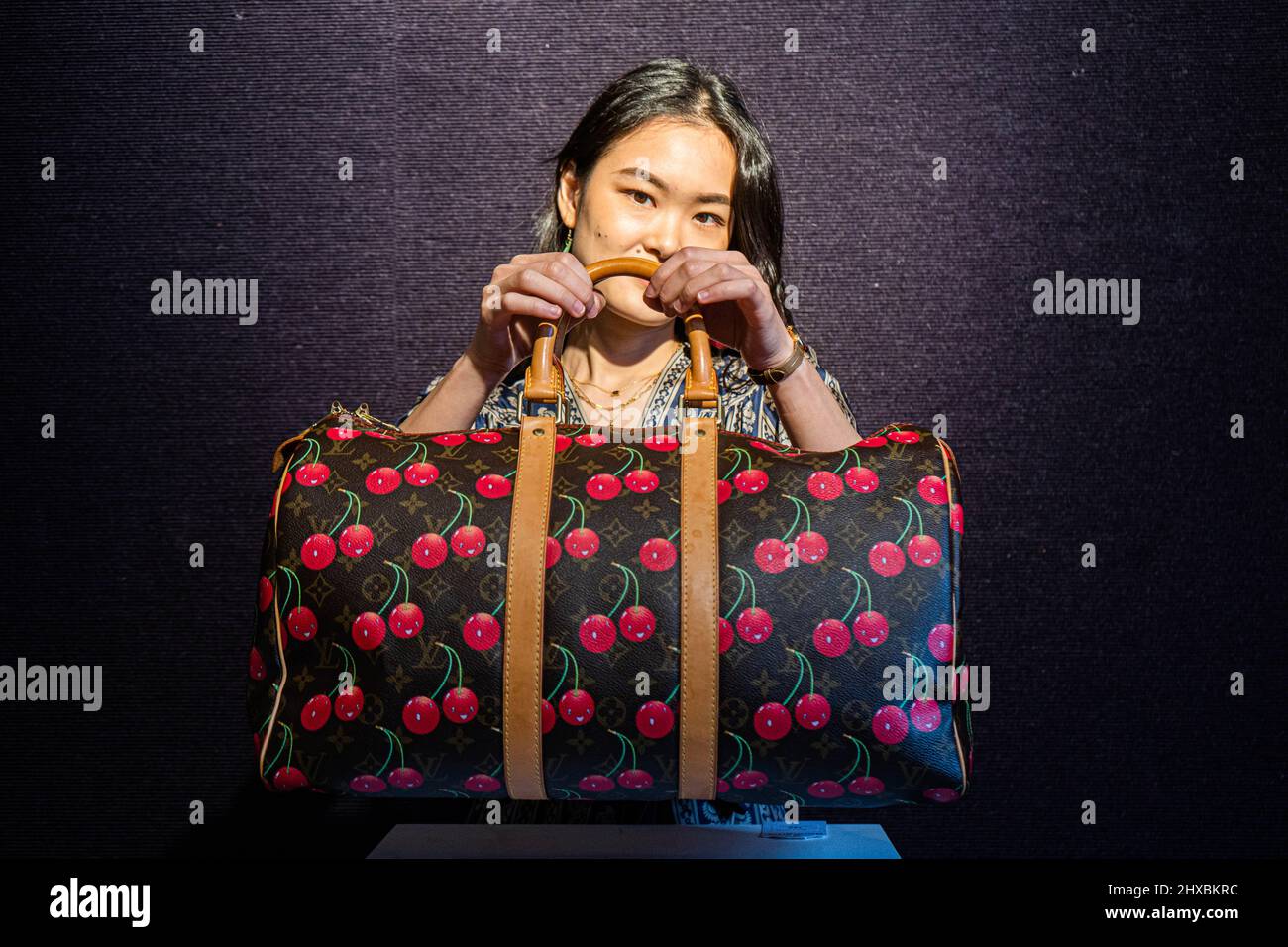 Murakami louis vuitton handbag hi-res stock photography and images