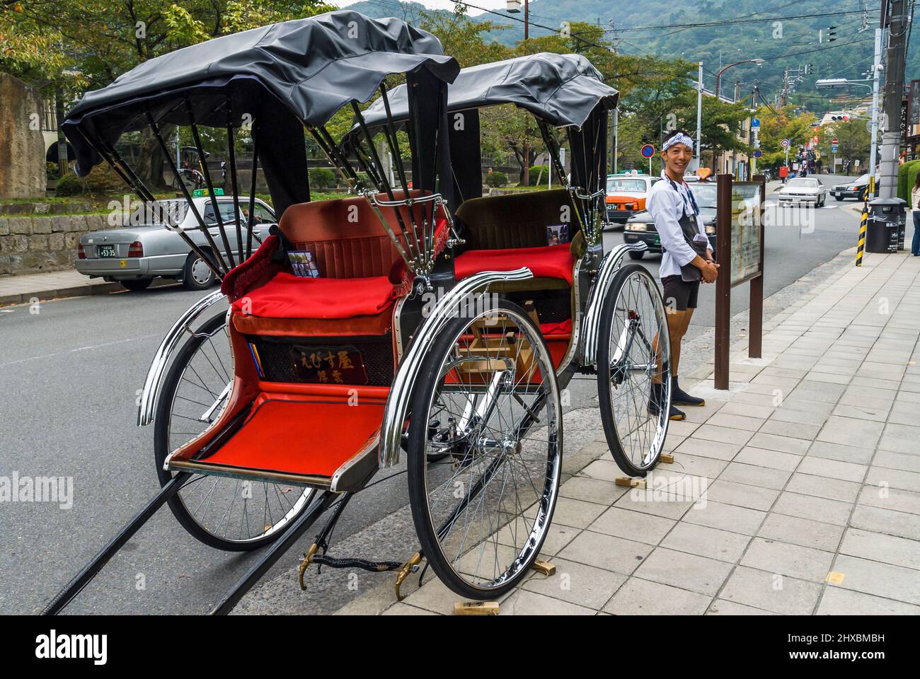 Rickshaw puller in Arashiyama, Kyoto, Japan. Stock Photo