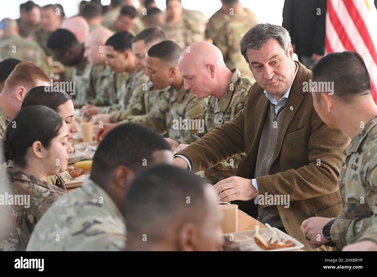 Markus SOEDER (Prime Minister of Bavaria and CSU Chairman) speaks to American soldiers on the occasion of a Weisswurst meal, Bavarian Weisswurst Fruehstueck Prime Minister Dr. Markus Soeder visits the US military training area Grafenwoehr, headquarters of the 7th Army Training Command on March 11th, 2022. Stock Photo