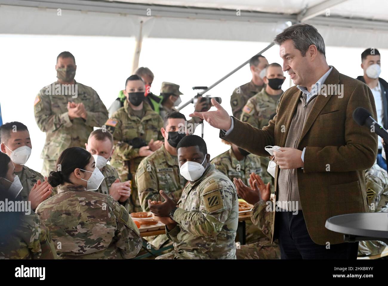 Markus SOEDER (Prime Minister of Bavaria and CSU Chairman) speaks to American soldiers on the occasion of a Weisswurst meal. Prime Minister Dr. Markus Soeder visits the US military training area Grafenwoehr, headquarters of the 7th Army Training Command on March 11th, 2022. Stock Photo