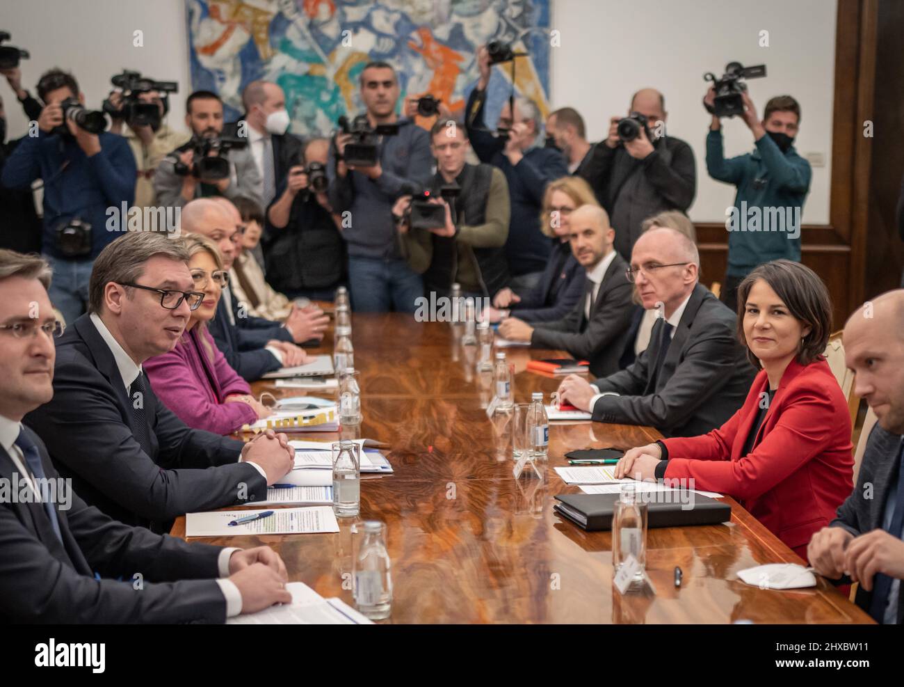 Belgrade, Serbia. 11th Mar, 2022. Annalena Baerbock (Bündnis90/Die Grünen, r), Foreign Minister, sits opposite Aleksander Vucic (2nd from left), President of the Republic of Serbia, in the Presidential Palace. Against the backdrop of the Russian war in Ukraine, Baerbock is campaigning for the Western Balkans to orient themselves further in the direction of Europe. Credit: Michael Kappeler/dpa/Alamy Live News Stock Photo