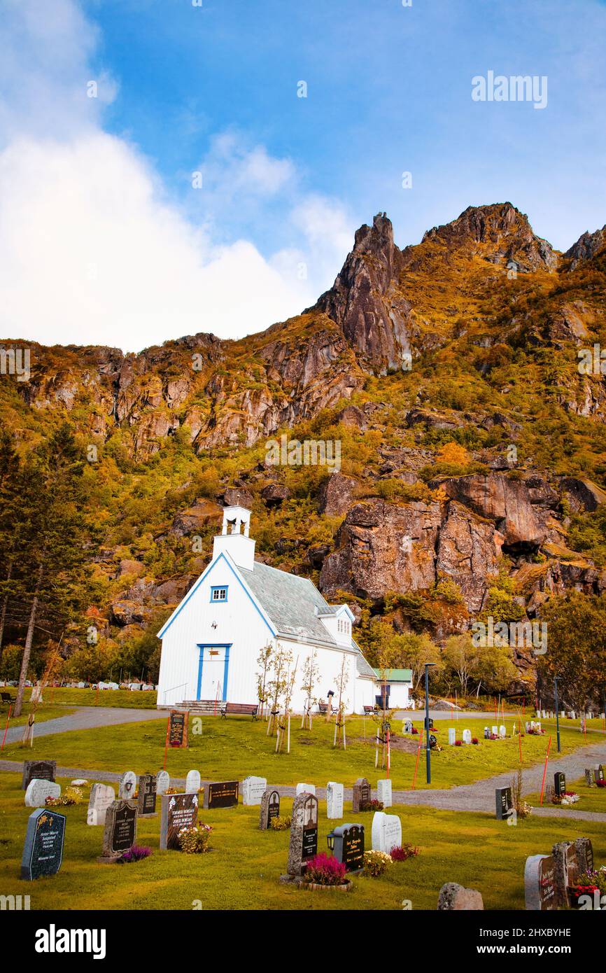 Svolvaer Kapell is a part of th Church of Norway sits below the Svolvaergeita ('The Svolvaer Goat') rock formation. Stock Photo