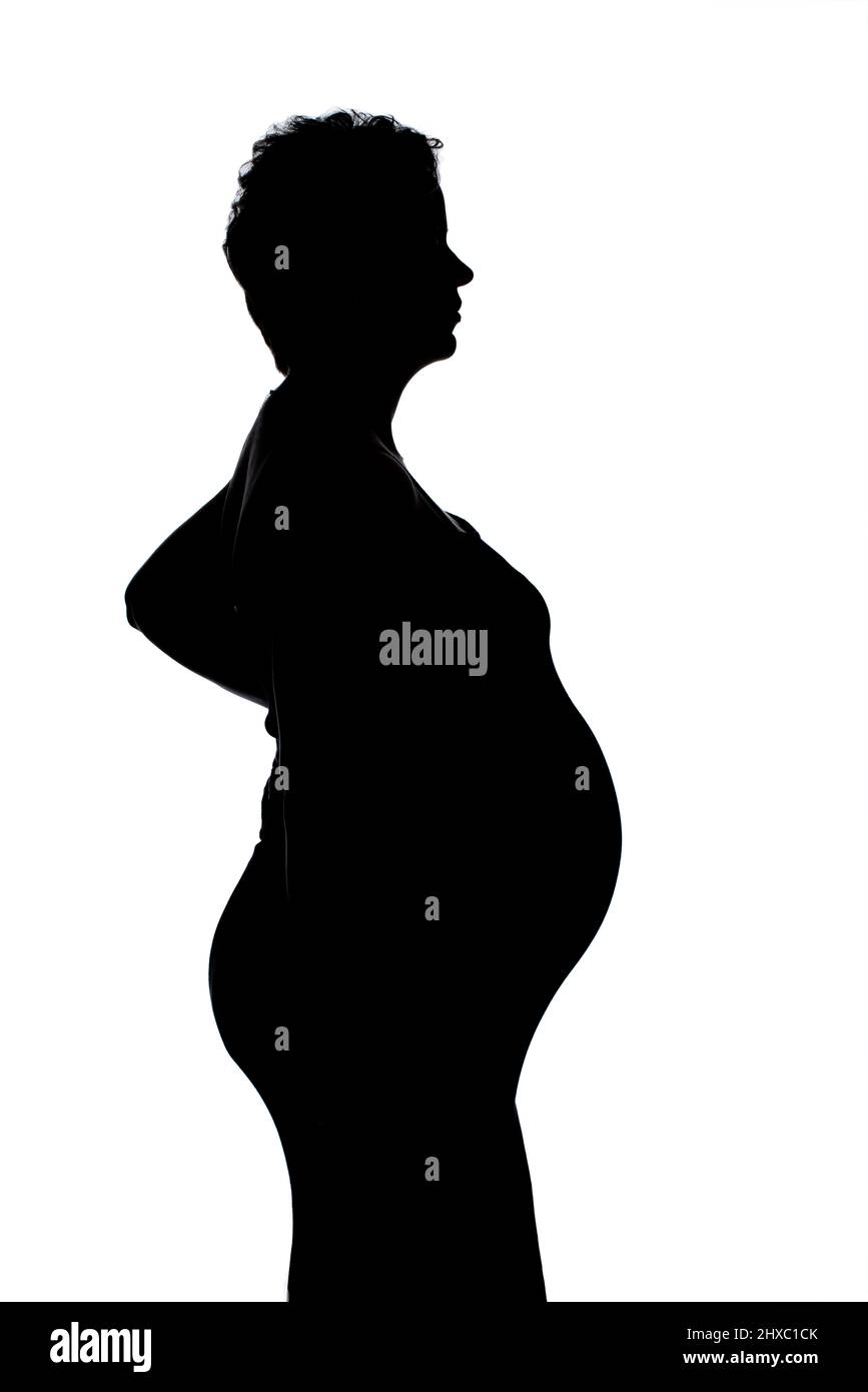 Portrait of pregnant woman on her third trimester, two weeks before