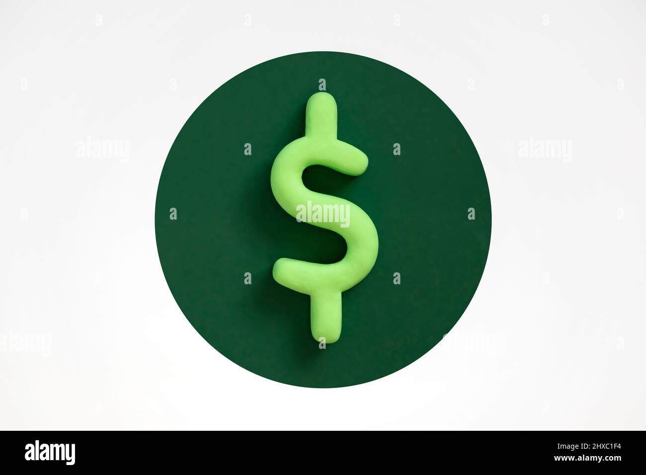 Symbol of american dollar currency. Three dimensional Green US dollar sign in the circle.  American business concept, dollar on financial market, prof Stock Photo