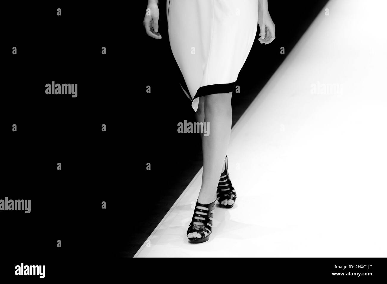 Fashion Show, CatwalkFashion catwalk runway event, model walking the show finale. Stock Photo