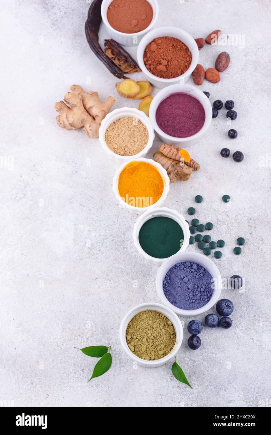 Various healthy superfoods powder Stock Photo - Alamy