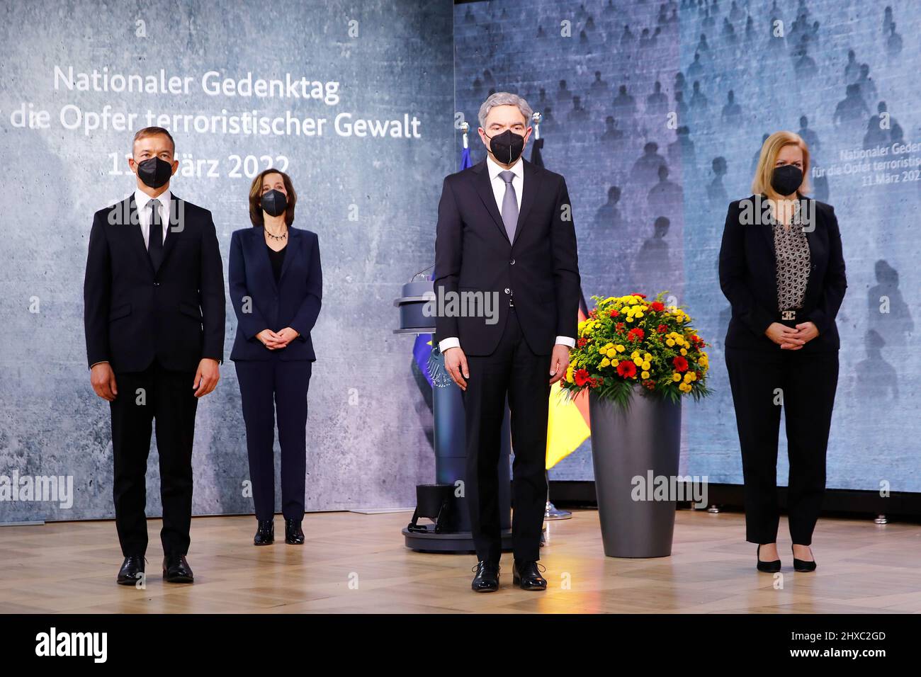 11 March 2022, Berlin: Pascal Kober (l-r), Federal Government Commissioner for the Concerns of Victims of Terrorist and Extremist Attacks in Germany, Petra Terhoeven, historian, Stephan Harbarth, President of the Federal Constitutional Court, and Nancy Faeser (SPD), Federal Minister of the Interior and Home Affairs, stand during the minute's silence at the German government's commemoration of the victims of terrorist violence. The Day of Remembrance, which is to be held annually on March 11, ties in at the national level with the European Day of Remembrance, which was established after the Mad Stock Photo