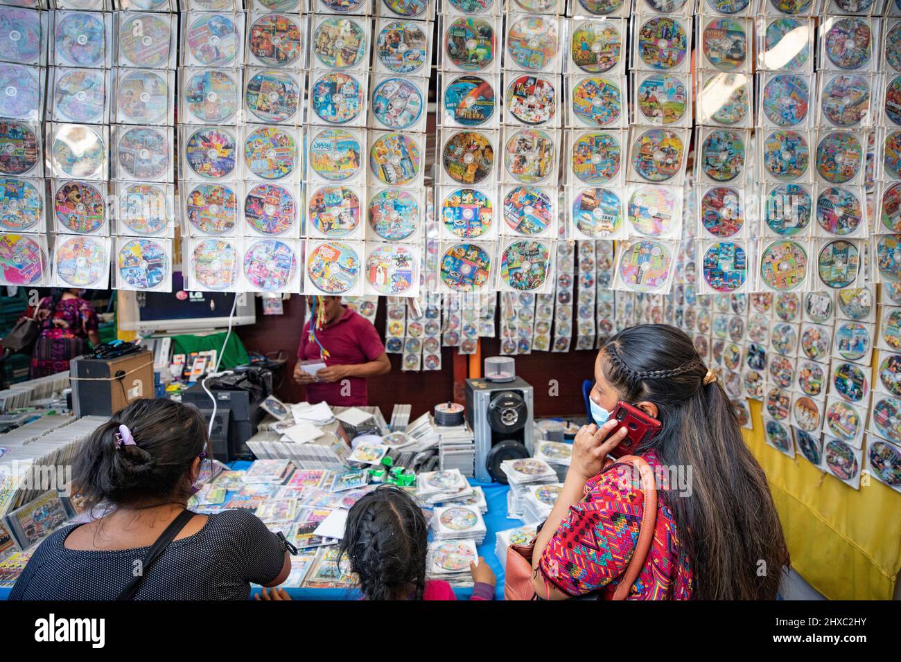 DVDs are for sale at the colorful weekly Chichicastenango Mayan Market in Guatemala, Central America. Stock Photo