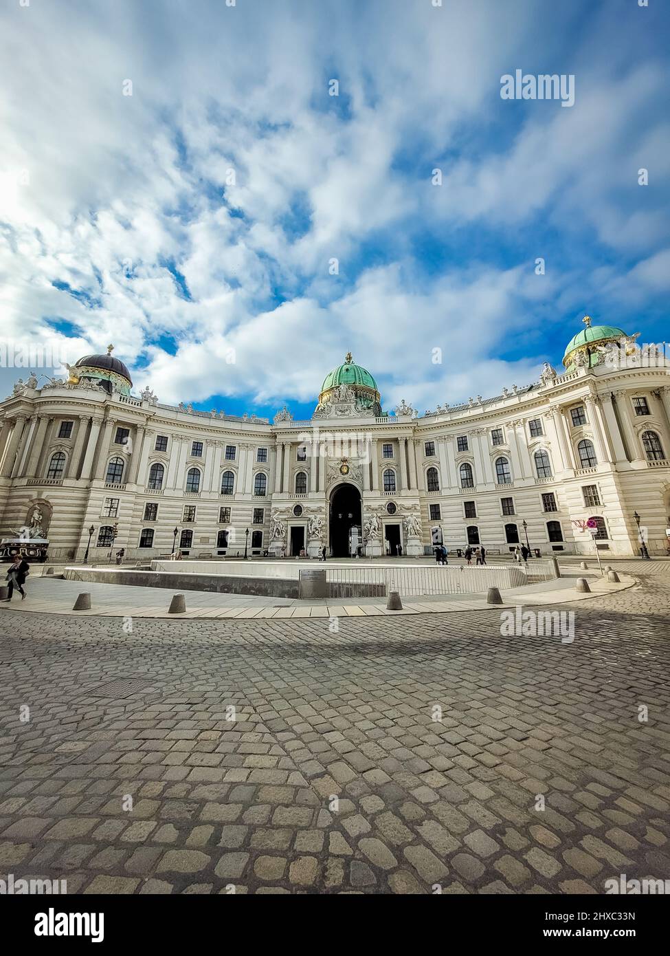 VIENNA, AUSTRIA, 19 FEBRUARY 2022: People walking nearby the Hofburg ...