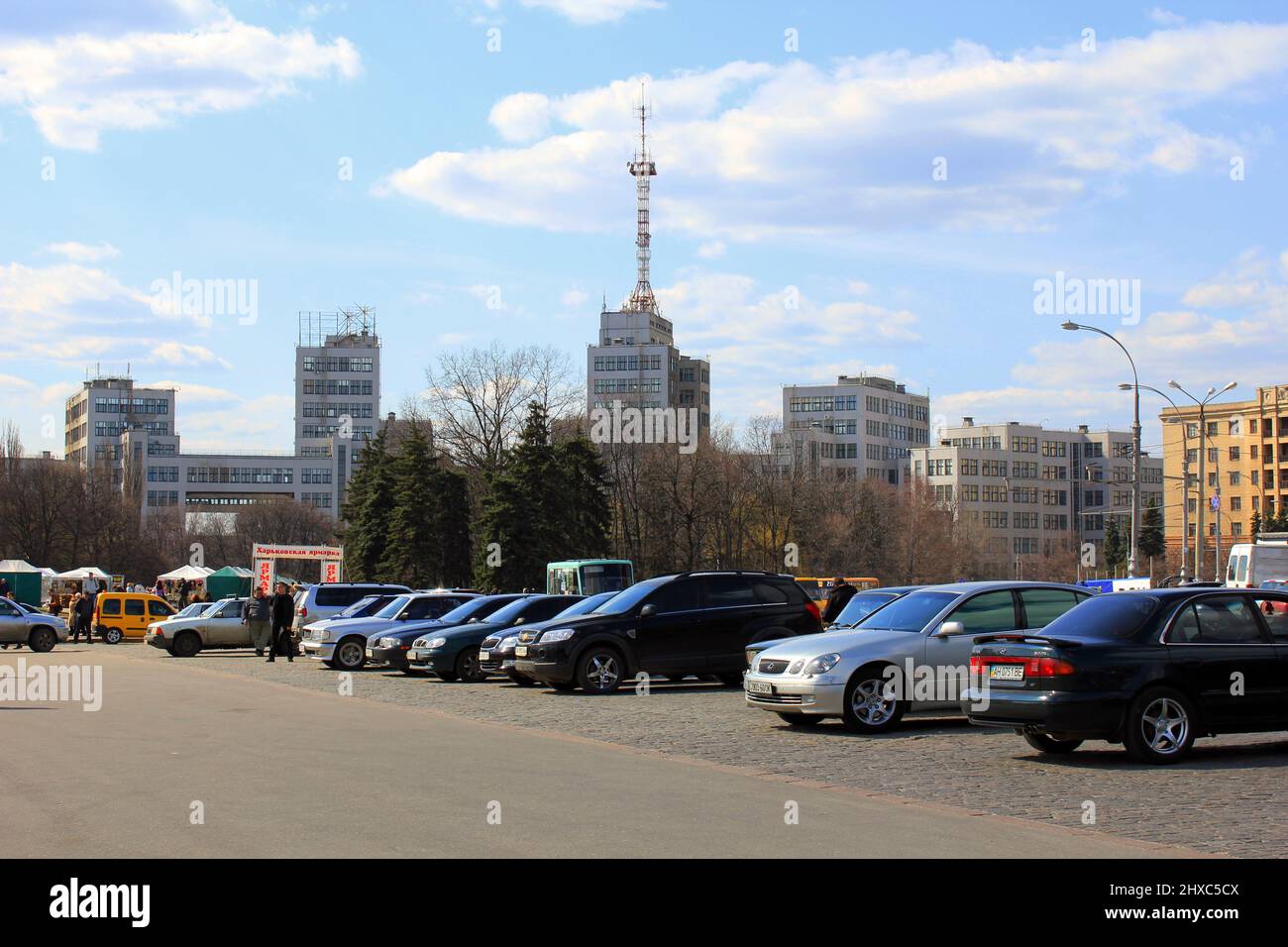 KHARKOV, UKRAINE - APRIL 21, 2011: This is the Liberty Square with the building of the State Industry, built in the style of constructivism of the 30s Stock Photo