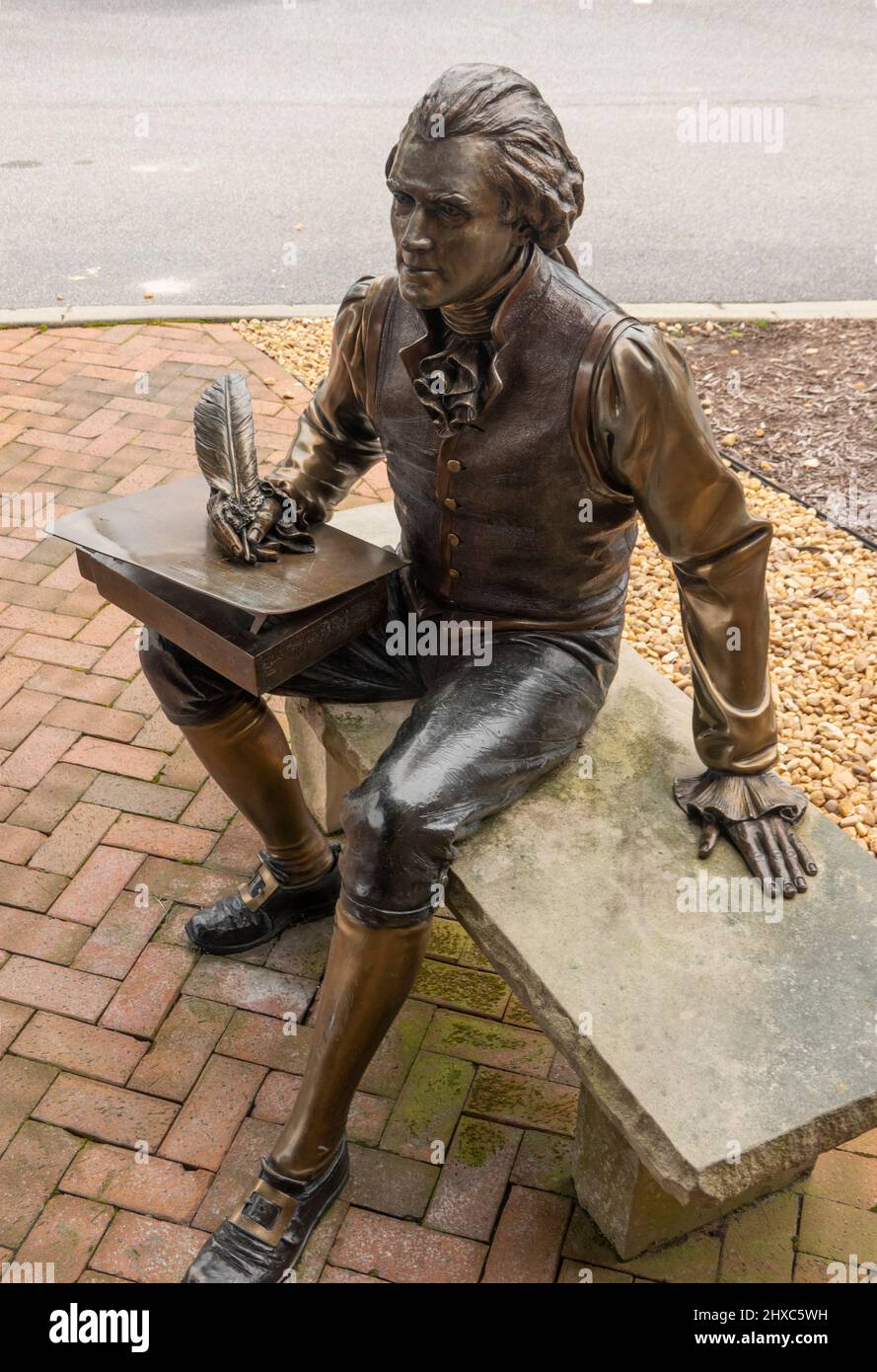 Thomas Jefferson bronze sculpture sitting on bench in Smithfield