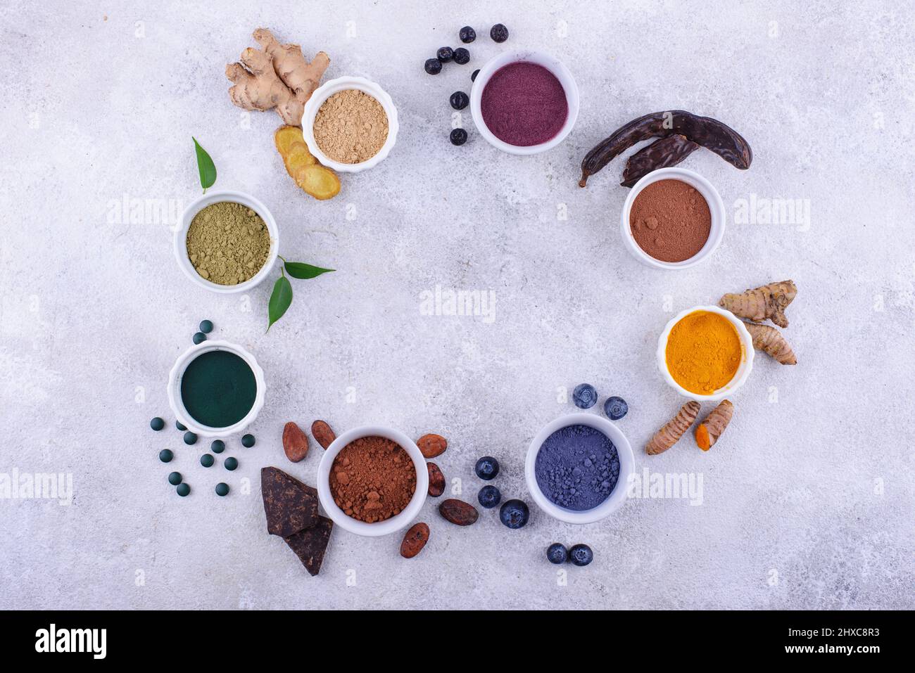 Various healthy superfoods powder Stock Photo - Alamy