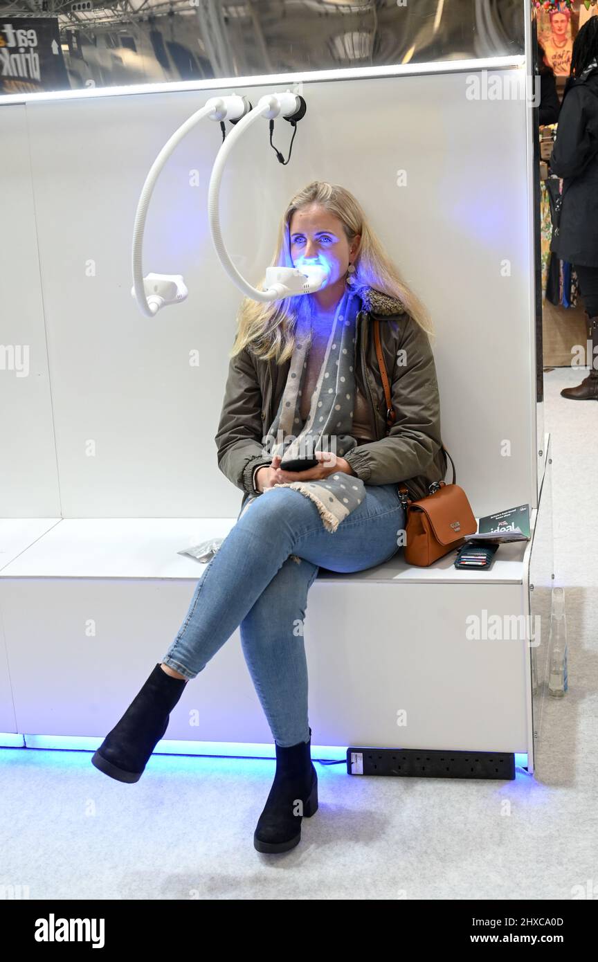 London, UK. 11 March 2022. Teeth whitening exhibition at Ideal Home Show 2022 at Olympia London. Credit: Picture Capital/Alamy Live News Stock Photo