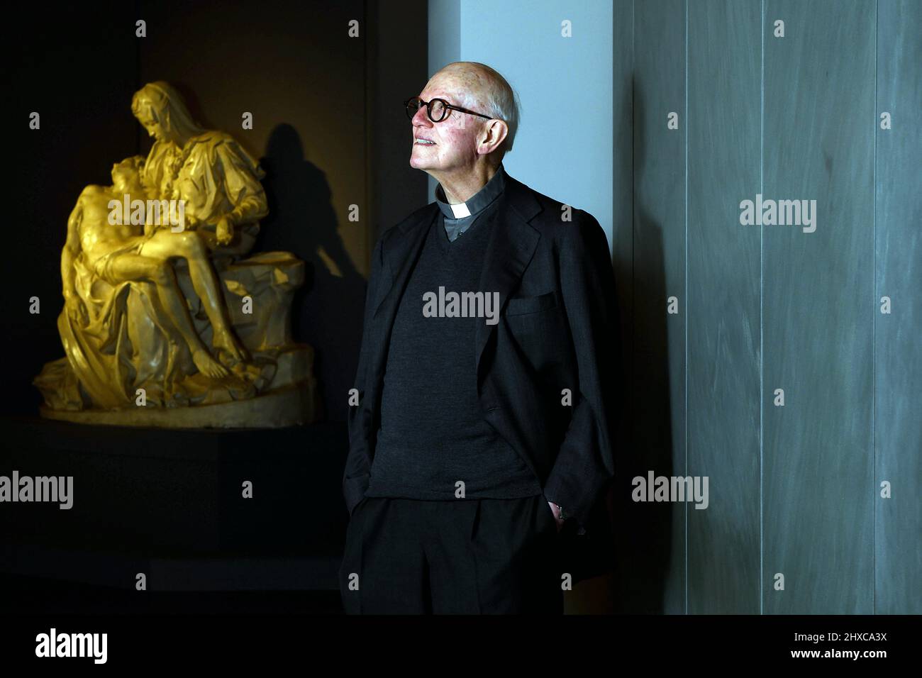 Italy, Florence, March 9, 2022 : Mons.Timothy Verdon, director of Museum Opera del Duomo, with the plaster cast of the Pieta of Michelangelo Buonarrot Stock Photo
