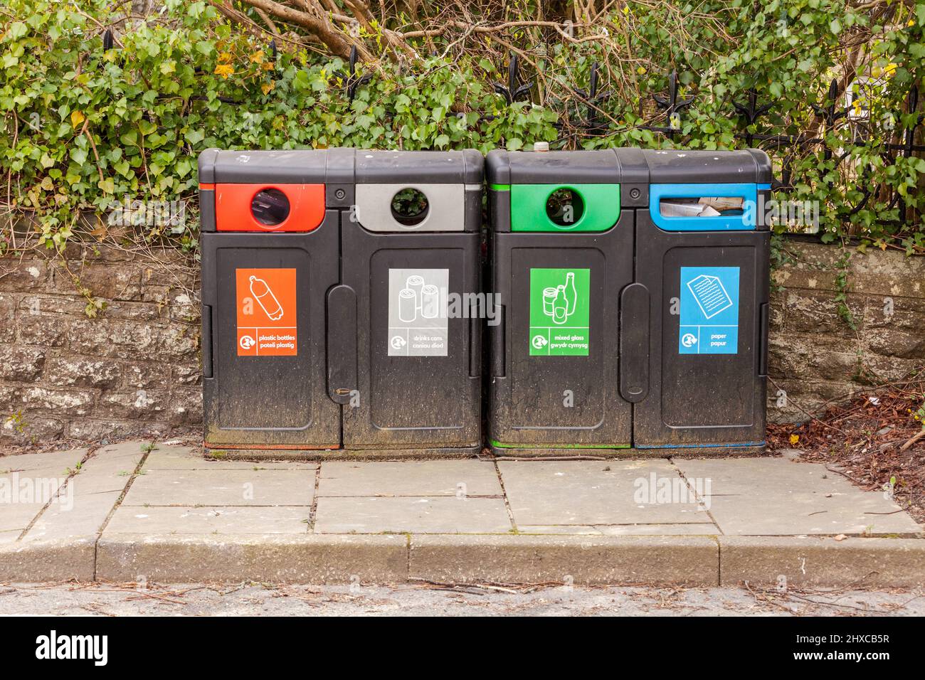 Colour coded waste recycling bins on local street Stock Photo Alamy