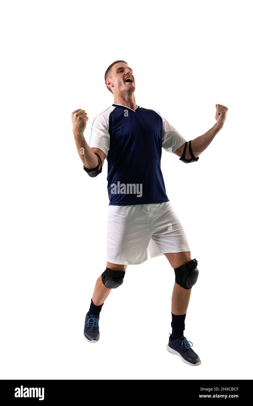 Happy young male caucasian handball player celebrating goal against white background Stock Photo