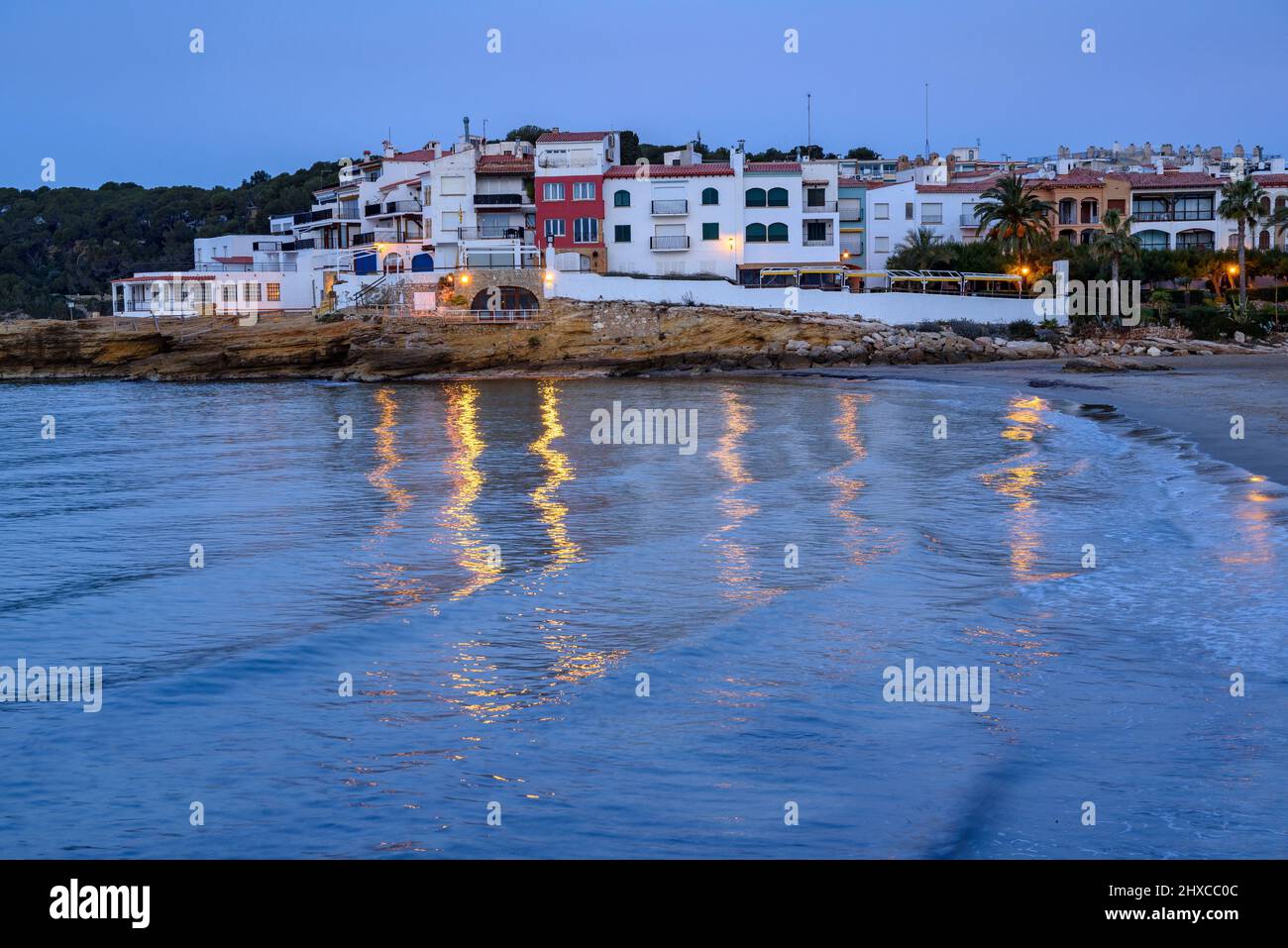 Sunrise on Roc de Sant Gaietà town and beach, on the Costa Daurada