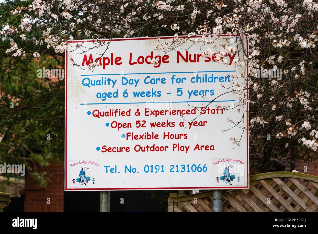Sign outside a day nursery.  Concept of childcare costs. Stock Photo