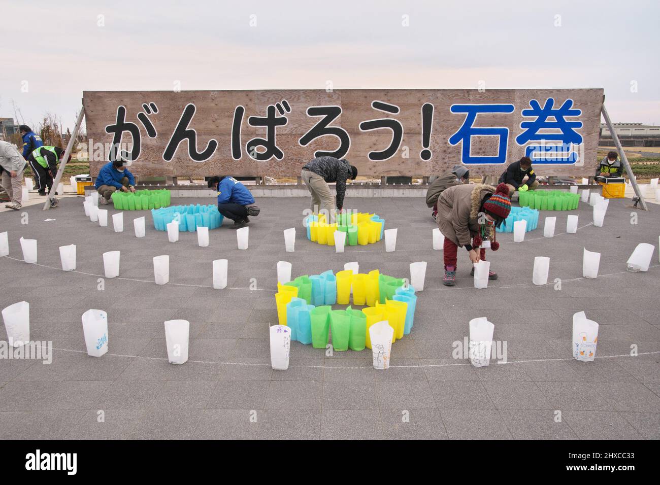 Ishinomaki, Japan. 11th Mar, 2022. People light a paper lanterns at Ishinomaki Minamihama Tsunami Recovery Memorial Park, Ishinomaki, Miyagi-prefecture, Japan on Friday, March 11, 2022. Photo by Keizo Mori/UPI Credit: UPI/Alamy Live News Stock Photo