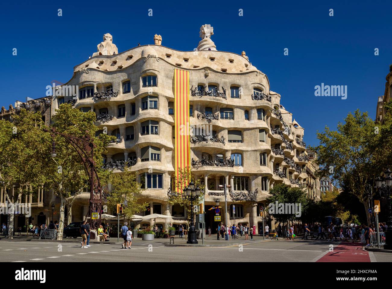 Gaudí's La Pedrera (Casa Milà) with the Catalan flag in commemoration of September 11, Catalonian Day (Barcelona, Catalonia, Spain) Stock Photo