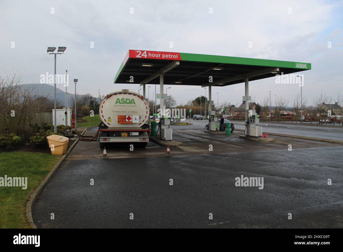 ASDA petrol tanker filling the fuel tank of a petrol station near