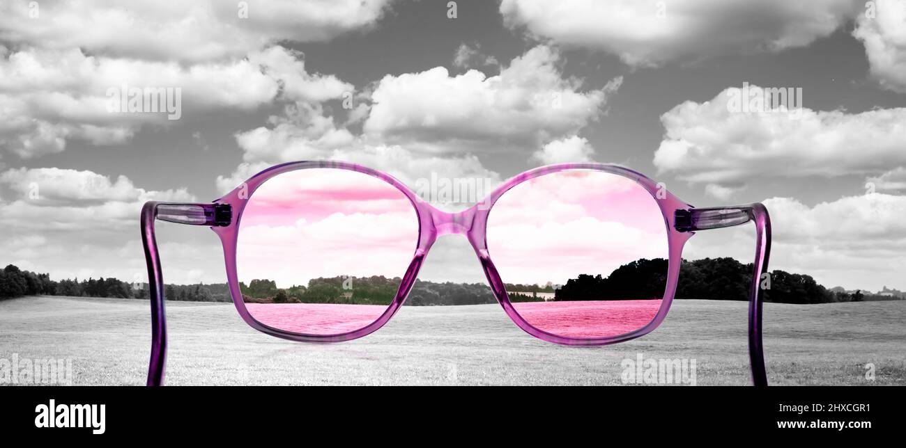 Seeing the world through rose-colored glasses Stock Photo