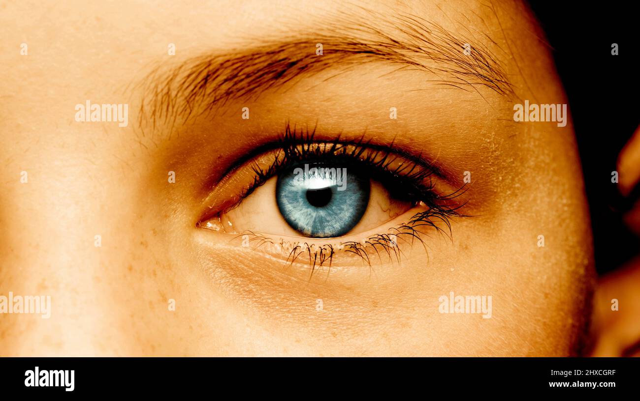 Eye with a blue pupil Stock Photo