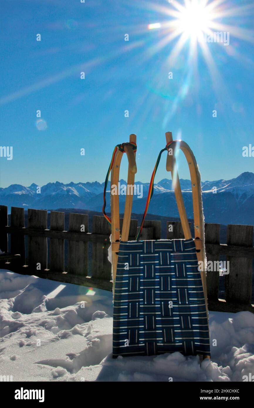 Winter hike to the Wang Alm in the Gaistal, wooden sledge in the Austrian Wetterstein Mountains, Austria, Tyrol, vacation, winter, mountain panorama Stock Photo