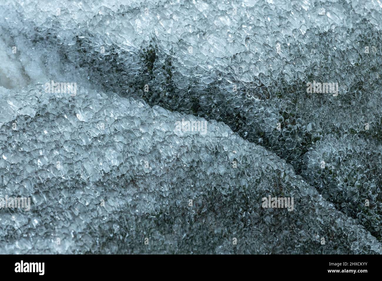 Stone with many ice crystals, Torup, Halland, Sweden Stock Photo