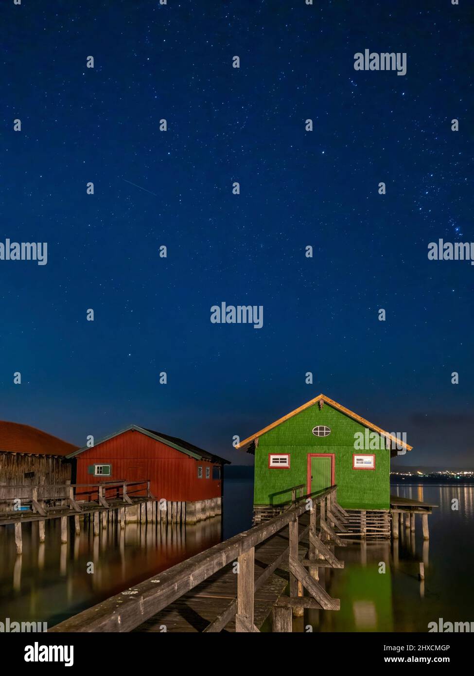 Colorful boathouses at night, Schondorf, Ammersee, Fünfseenland, Upper Bavaria, Bavaria, Germany, Europe Stock Photo