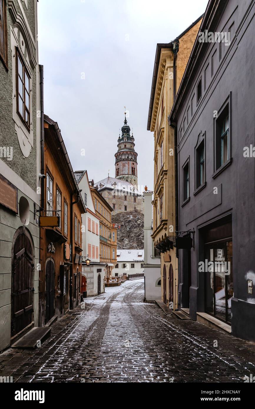 Cesky Krumlov,Czech Republic.Empty snowy street of famous Czech medieval town.Historic centre with Gothic,Renaissance,Baroque architecture and castle. Stock Photo