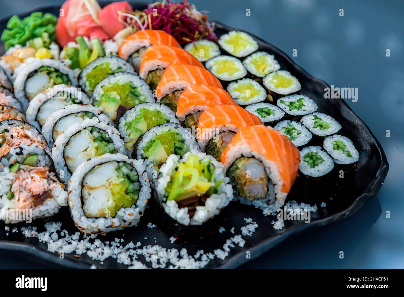 Overhead Japanese sushi food. Maki, rolls with crab, salmon, tuna