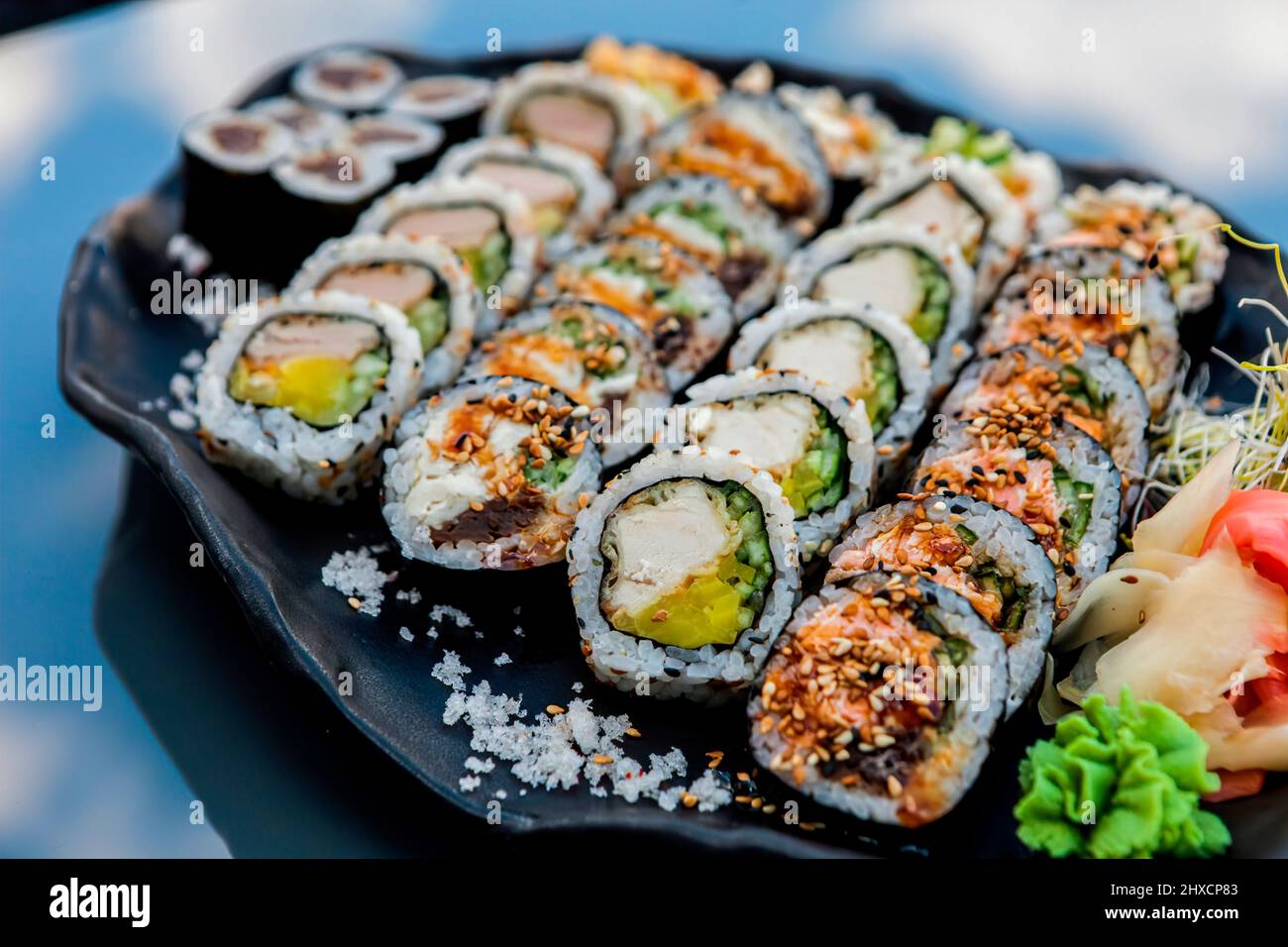 Overhead Japanese sushi food. Maki, rolls with crab, salmon, tuna