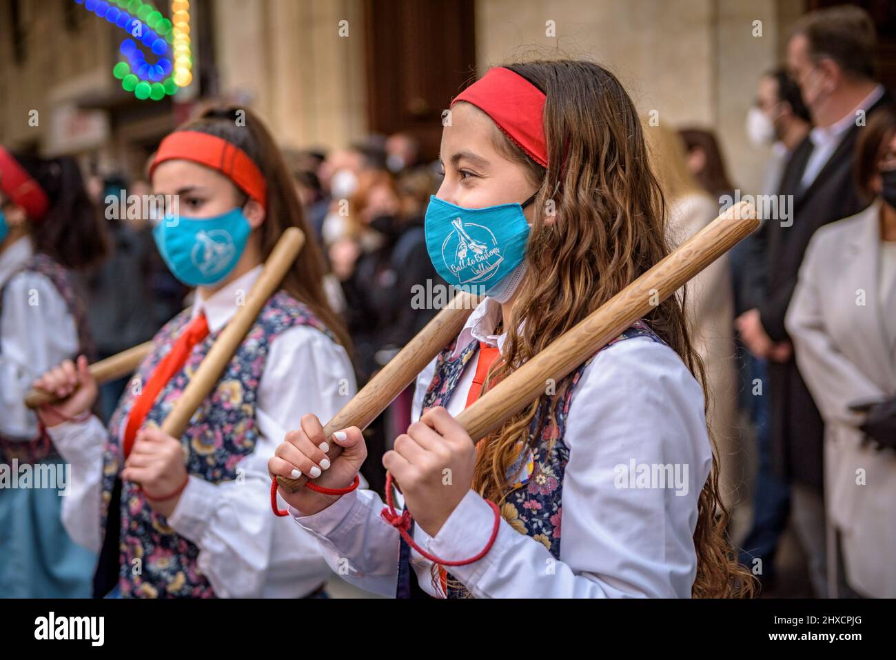 Valls stick dance in the Procession of the 2022 (2021+1) Valls Decennial Festival, in honor of the Virgin of the Candlemas in Valls (Tarragona, Spain) Stock Photo