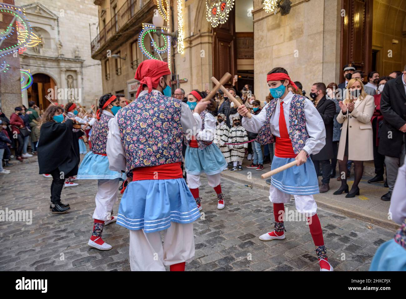 Valls stick dance in the Procession of the 2022 (2021+1) Valls Decennial Festival, in honor of the Virgin of the Candlemas in Valls (Tarragona, Spain) Stock Photo