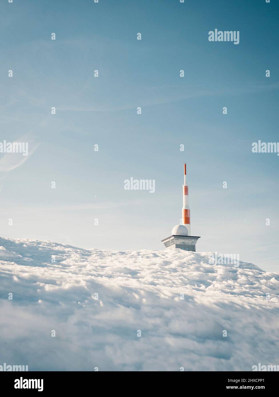 Radio Antenna on the Brocken with ice in the foreground during winter Stock Photo