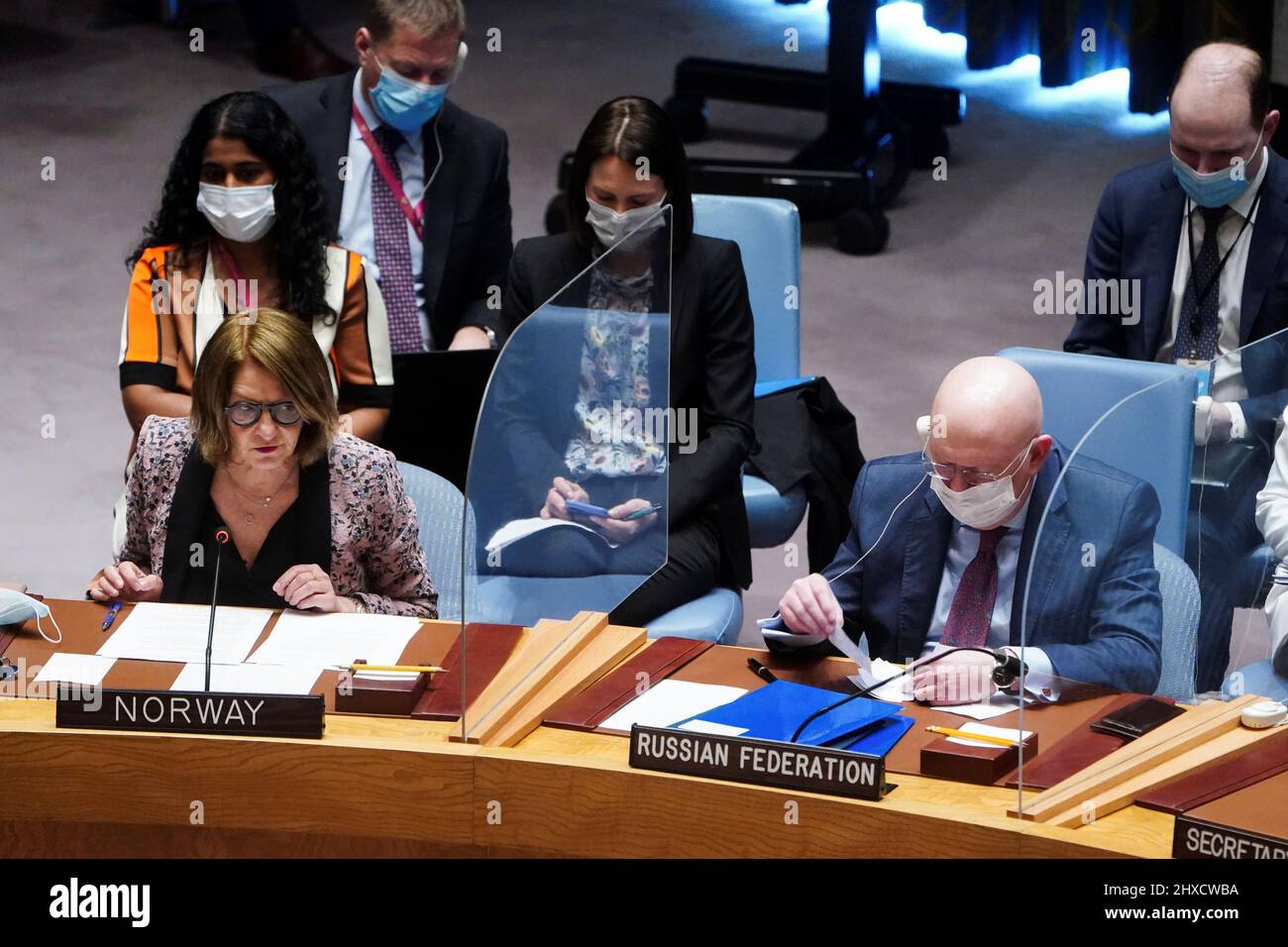 Norway's Ambassador to the U.N. Mona Juul speaks as she sits next to Russia's Ambassador to the U.N. Vasily Nebenzya during the United Nations Security Council meeting on Threats to International Peace and Security, following Russia's invasion of Ukraine, in New York City, U.S. March 11, 2022. REUTERS/Carlo Allegri Stock Photo