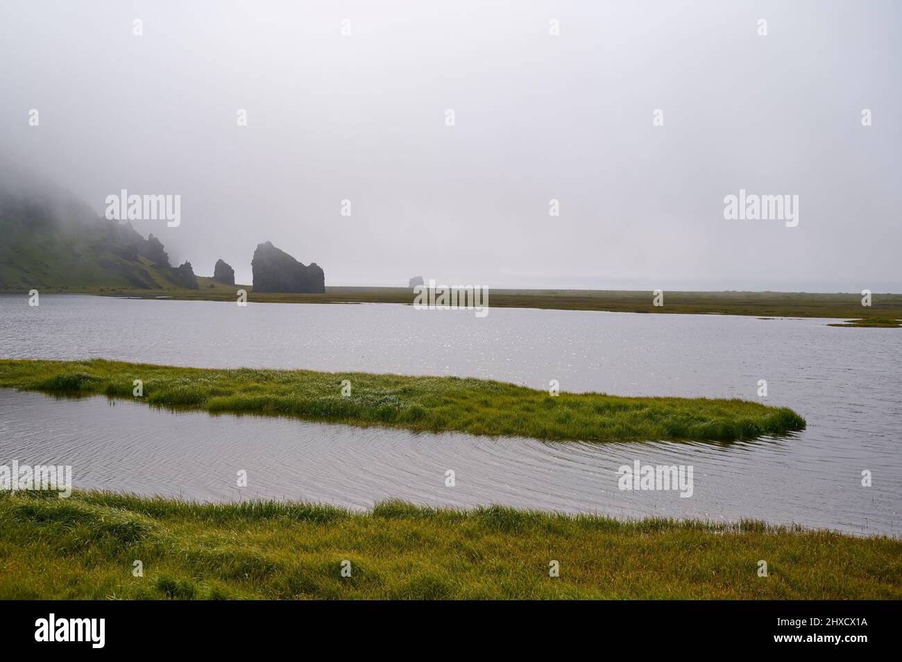 Lake, Fog, Summer, Cape Dyrholaey, Vik, Sudurland, SuÃ°urnes, Iceland Stock Photo