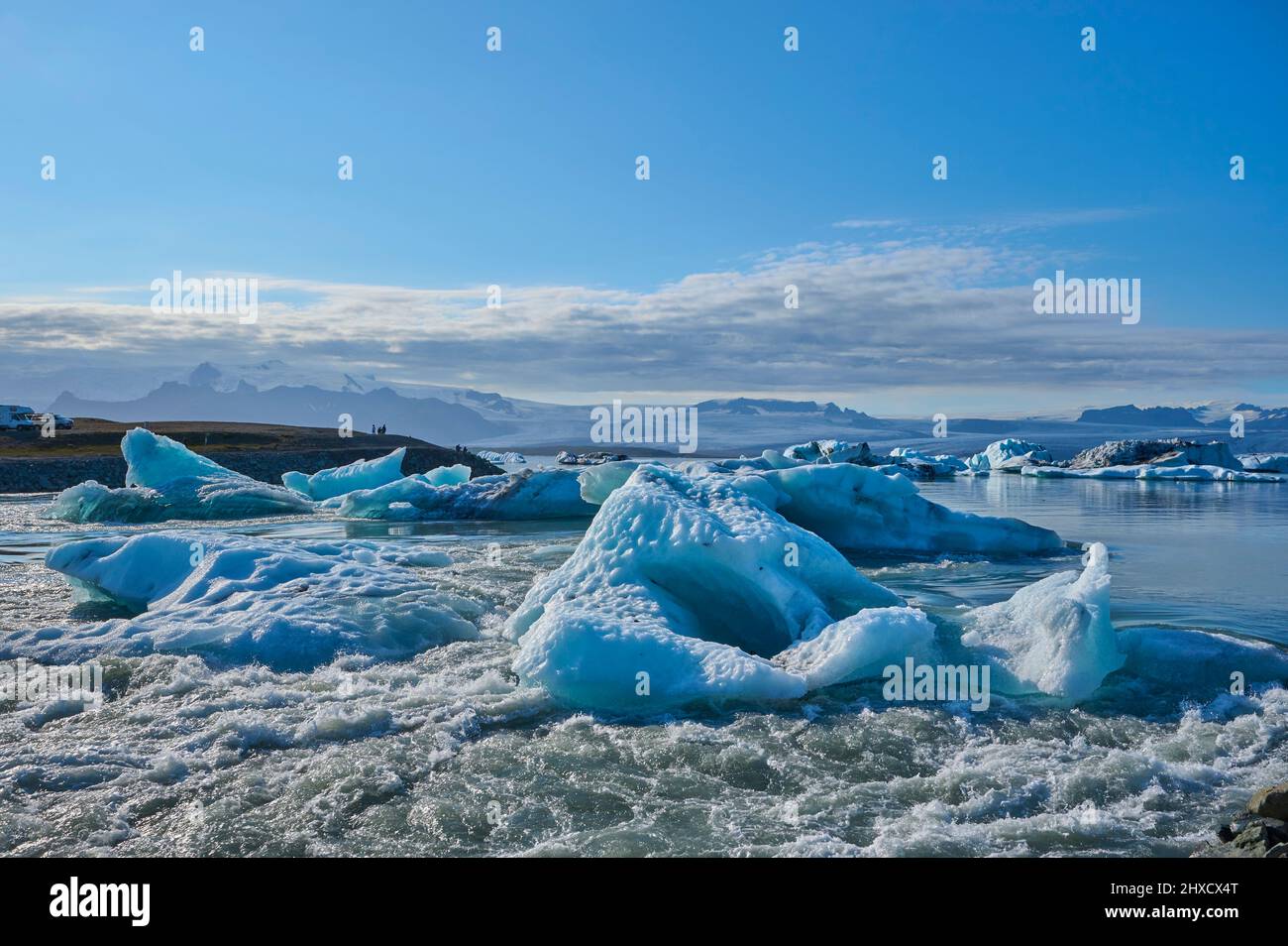 Glacier lagoon, ice, floes, fog, clouds, sun, evening, summer, Jokulsarlon, Austurland, Iceland Stock Photo